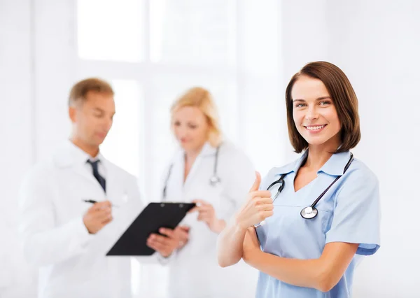 Young female doctor with stethoscope — Stock Photo, Image