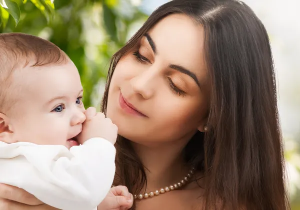 Happy mother with adorable baby — Stock Photo, Image