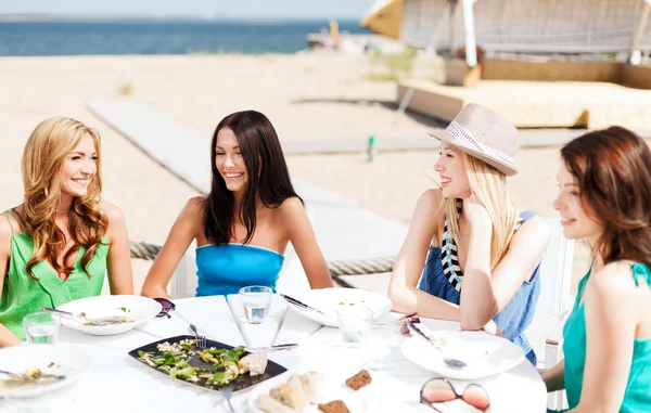 Girls in cafe on the beach — Stock Photo, Image