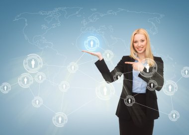 Businesswoman pointing at contact icons clipart