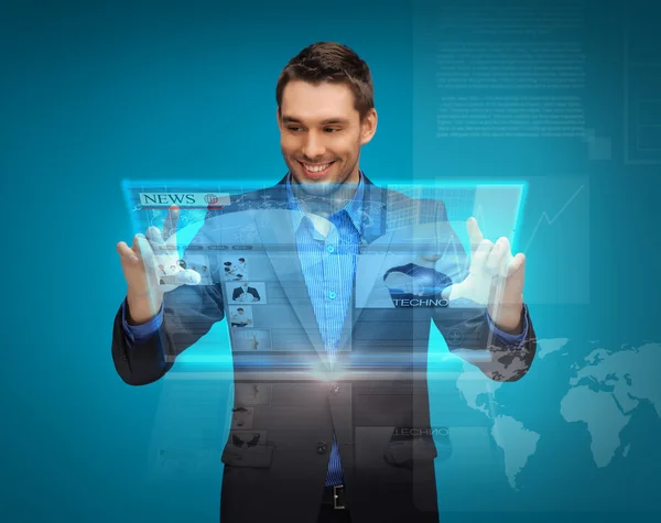 Businessman with virtual screen — Stock Photo, Image