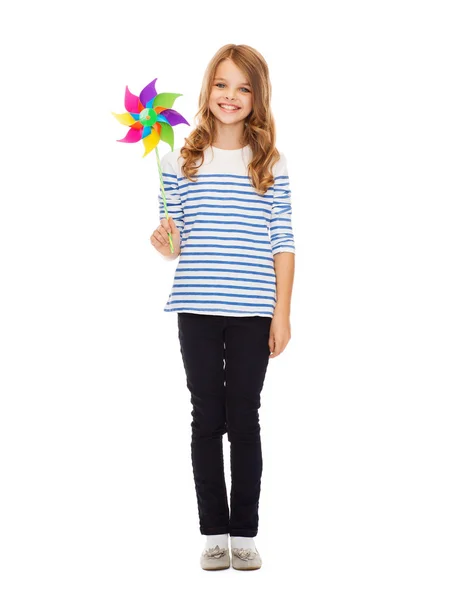 Child with colorful windmill toy — Stock Photo, Image