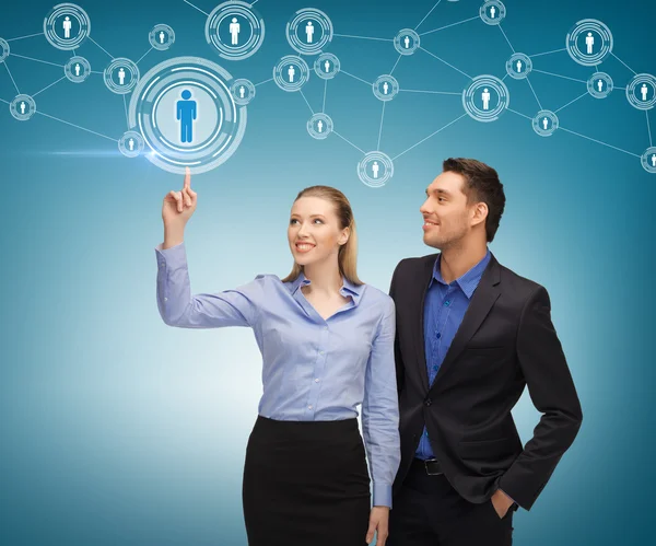 Man and woman working with virtual screen — Stock Photo, Image