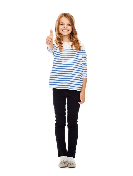 Cute little girl showing thumbs up — Stock Photo, Image