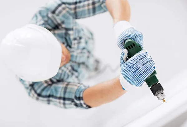 Man drilling the wall — Stock Photo, Image