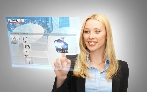 Businesswoman pressing buttons on virtual screen — Stock Photo, Image