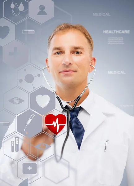 Male doctor with stethoscope and virtual screen — Stock Photo, Image