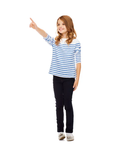 Girl pointing at imaginary screen — Stock Photo, Image