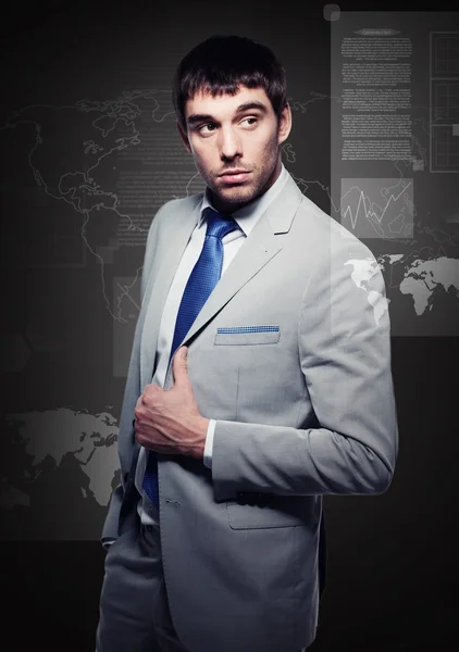 Buisnessman with virtual screens — Stock Photo, Image