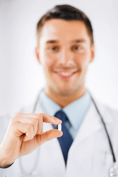 Doctor with pill in hospital — Stock Photo, Image
