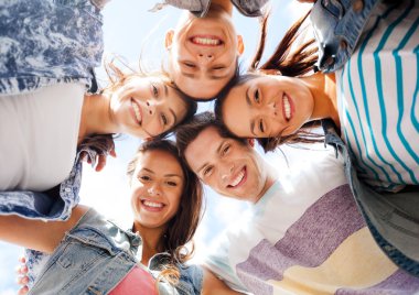 Group of teenagers looking down clipart