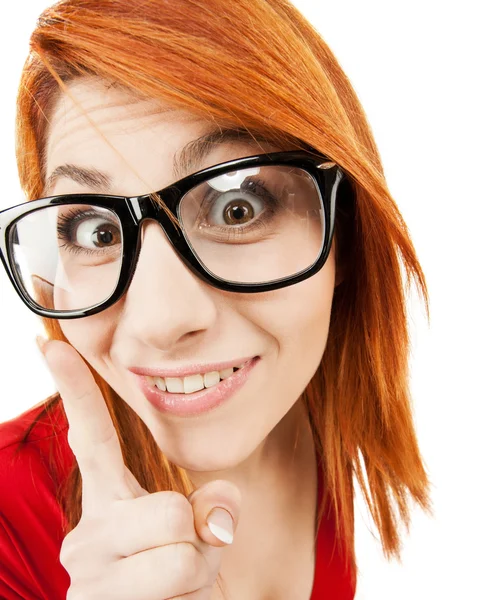 Frau in Brille mit erhobenem Finger — Stockfoto