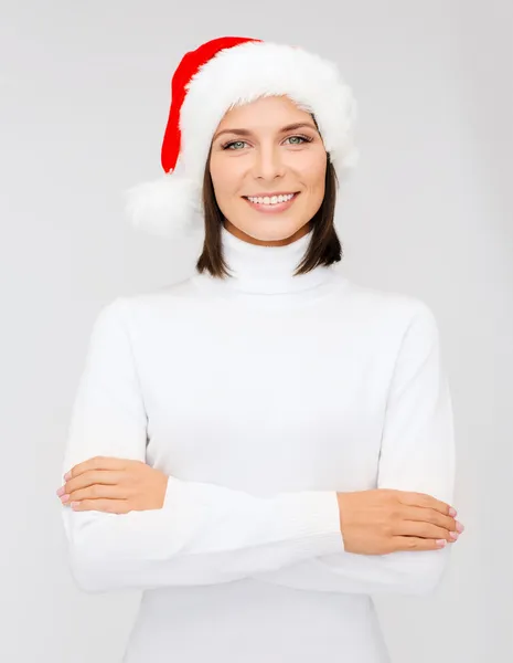 Mujer sonriente en sombrero de ayudante de santa —  Fotos de Stock