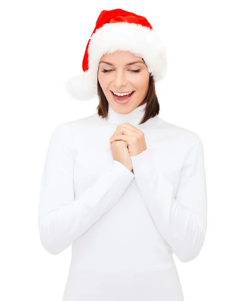 Donna sorpresa in cappello Babbo Natale helper — Foto Stock