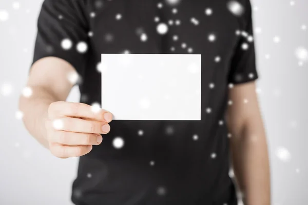 Mano de hombre con papel en blanco —  Fotos de Stock