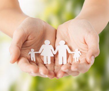 Womans hands with paper man family clipart
