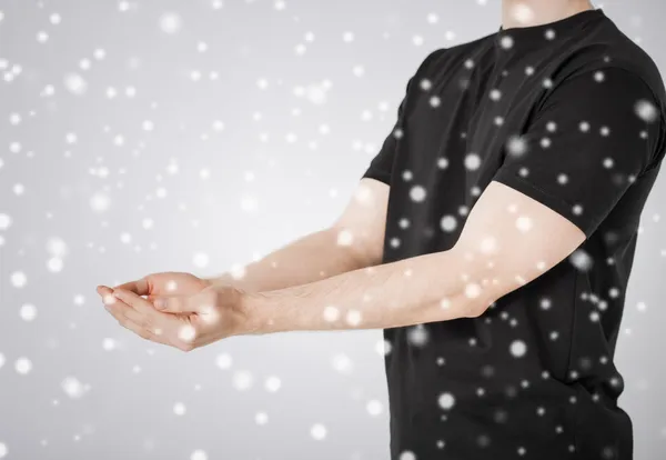 Man hands showing something — Stock Photo, Image