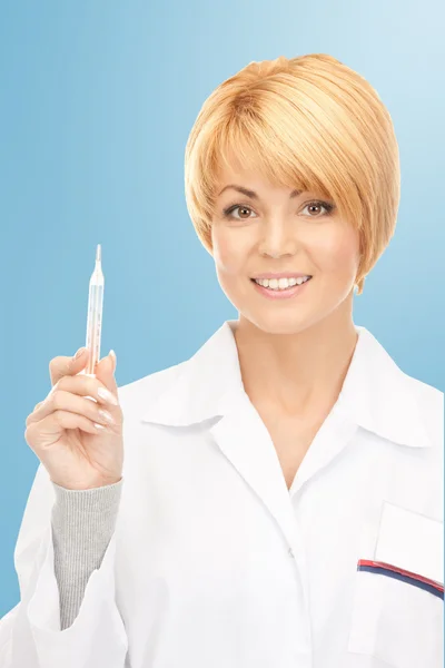 Attractive female doctor with thermometer — Stock Photo, Image