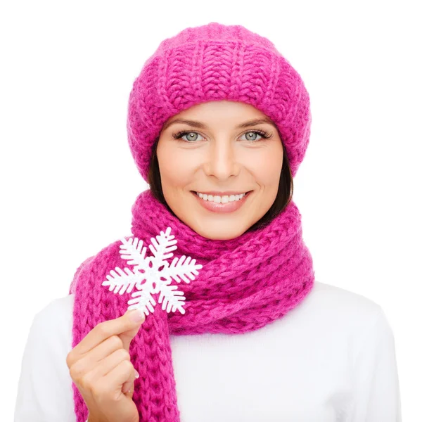 Woman in hat and muffler with big snowflake — Stock Photo, Image