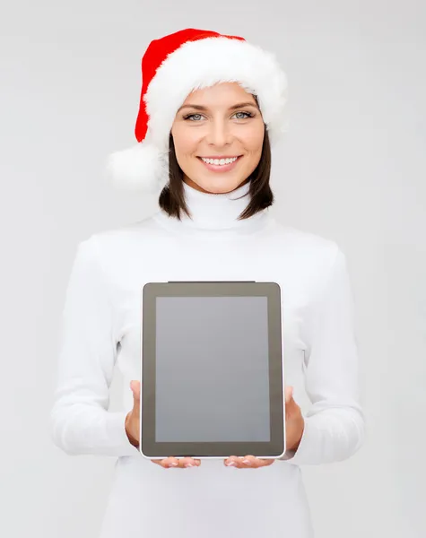 Žena v santa hat pomocníka s tablet pc — Stock fotografie