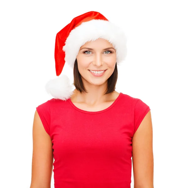 Mujer sonriente en sombrero de ayudante de santa —  Fotos de Stock