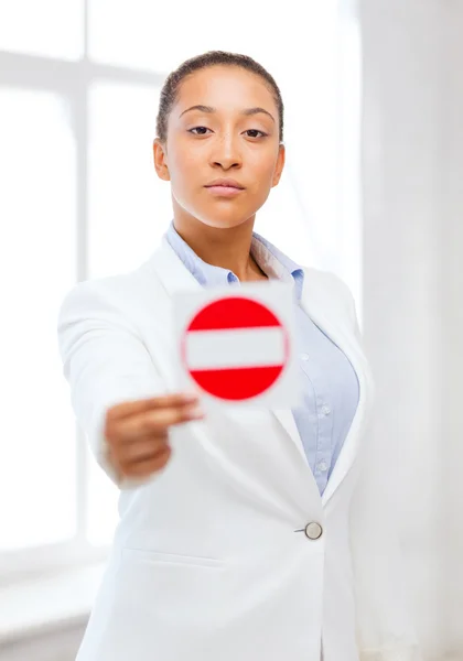 African woman showing stop sign — Stock Photo, Image
