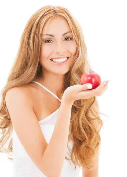 Mujer sonriente con manzana roja — Foto de Stock