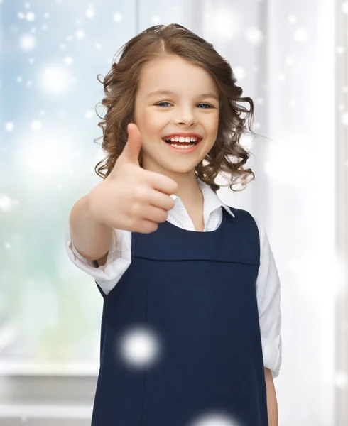 Pre-teen girl showing thumbs up — Stock Photo, Image