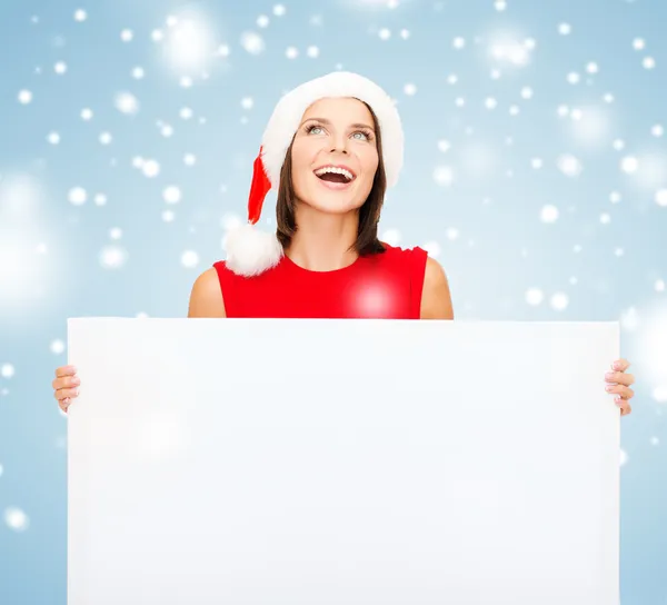 산타 도우미 모자 빈 화이트 보드에 여자 — 스톡 사진