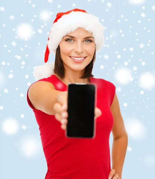 Woman in santa helper hat with smartphone — Stock Photo, Image