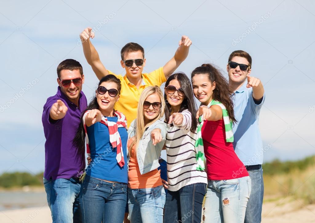 Group Of Friends Having Fun On The Beach Stock Photo