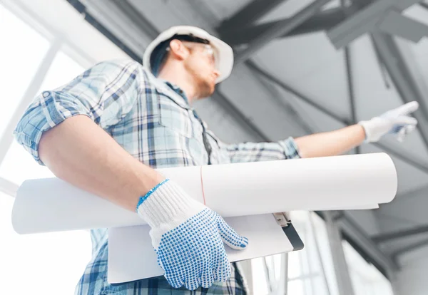 Man with blueprint — Stock Photo, Image