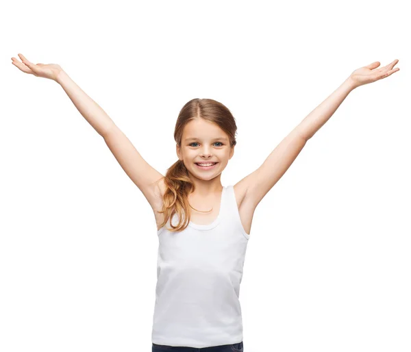 Smiling teenage girl with raised hands — Stock Photo, Image