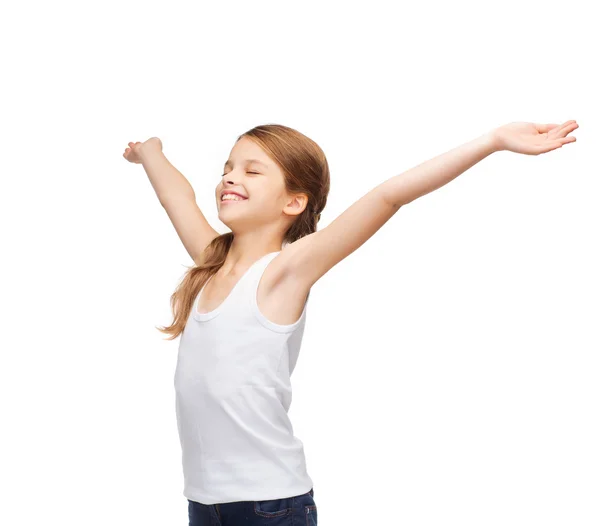 Smiling teenage girl with raised hands — Stock Photo, Image