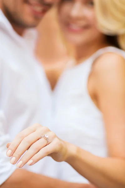 Romantic man proposing to beautiful woman Stock Photo