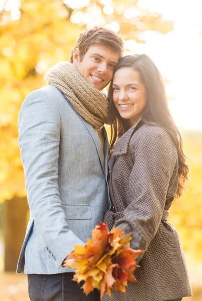 Romantic couple in the autumn park — Stock Photo, Image