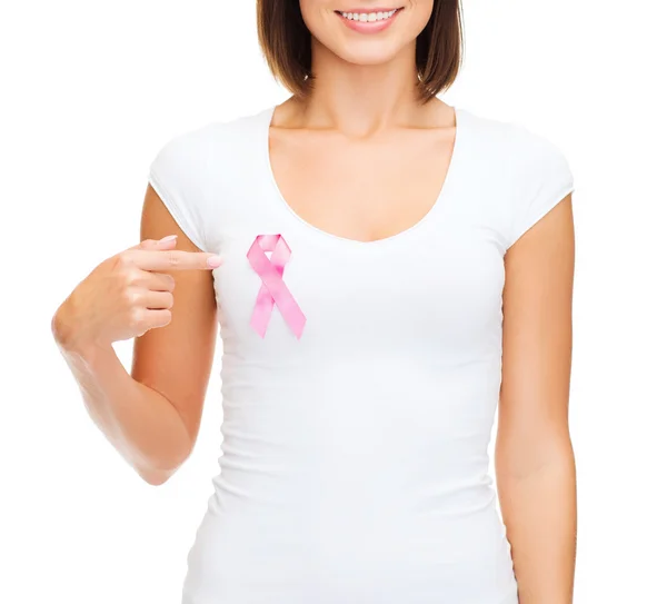 Woman in blank t-shirt with pink cancer ribbon — Stock Photo, Image