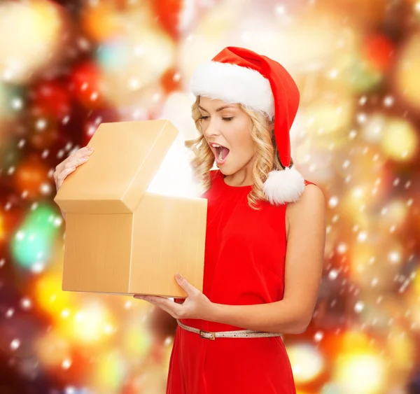 http://st.depositphotos.com/1017986/3360/i/450/depositphotos_33609307-Smiling-woman-in-santa-helper-hat-with-gift-box.jpg