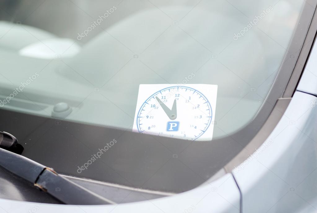 Parking clock on car dashboard — Stock Photo © Syda_Productions 33609843