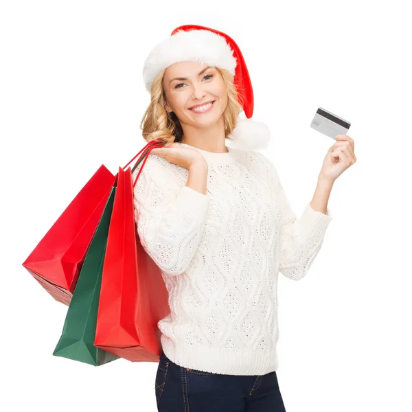 Donna con shopping bag e carta di credito — Foto Stock