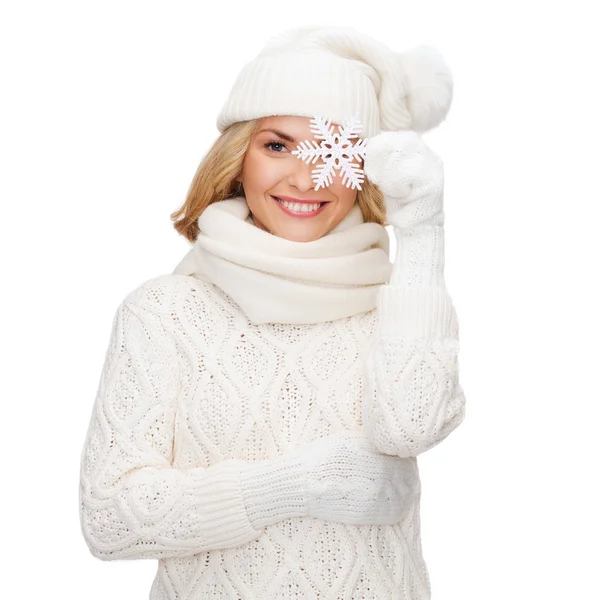 Woman with big snowflake — Stock Photo, Image