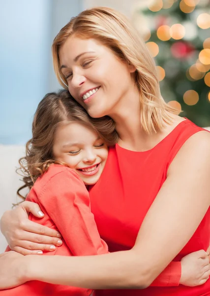 Hugging mother and daughter — Stock Photo, Image