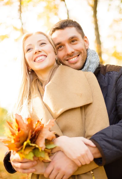 Romantic couple in the autumn park — Stock Photo, Image