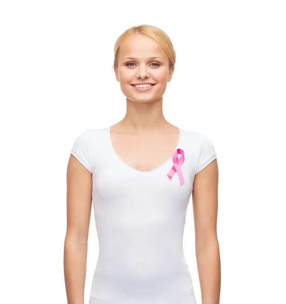 Woman in blank t-shirt with pink cancer ribbon — Stock Photo, Image