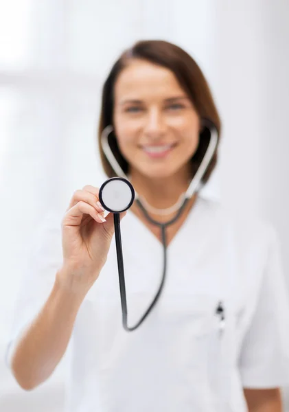 Female doctor with stethoscope Royalty Free Stock Photos