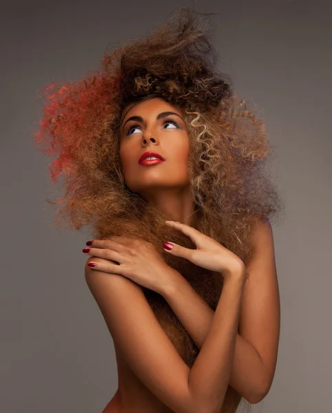 Woman with long curly hair — Stock Photo, Image