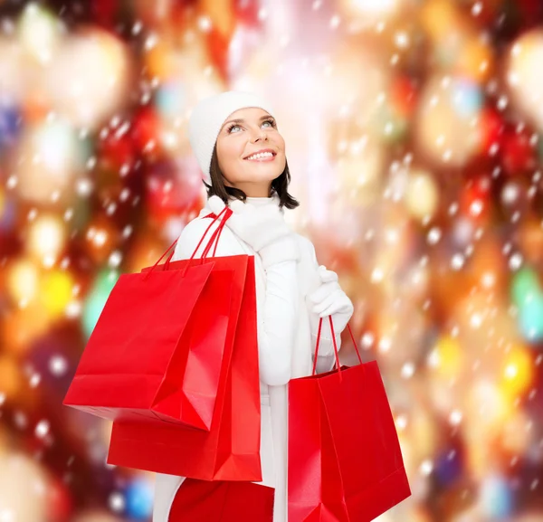 Foto de mujer feliz con bolsas de compras —  Fotos de Stock