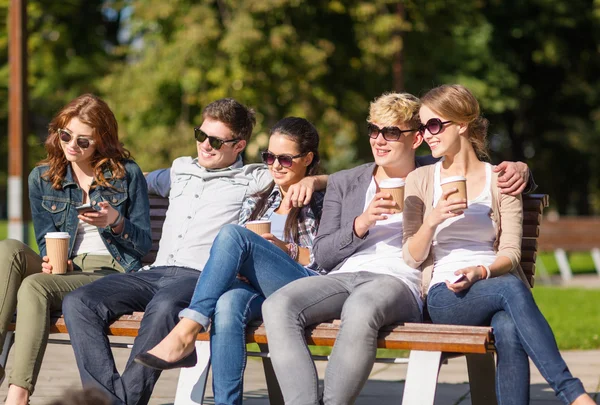 Group of students or teenagers hanging out — Stock Photo, Image