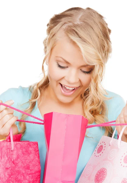 Foto de mujer feliz con bolsas de compras —  Fotos de Stock