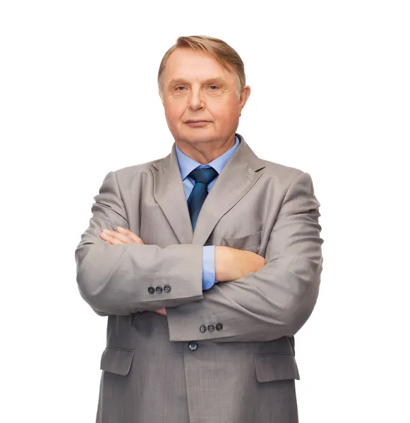 Serious businessman or teacher in suit — Stock Photo, Image